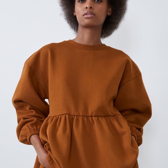 Zara Tops - Zara peplum crewneck sweatshirt in a rust color size medium